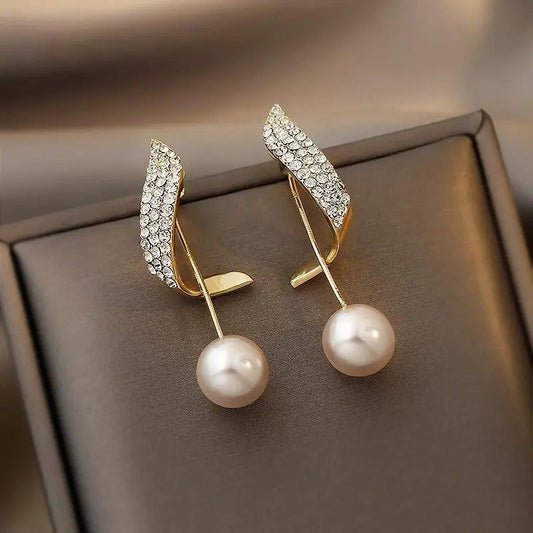 Boucles d'oreilles en or avec perles