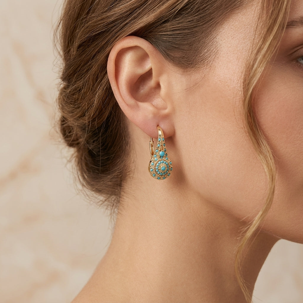 Boucles d'oreilles avec turquoise en or