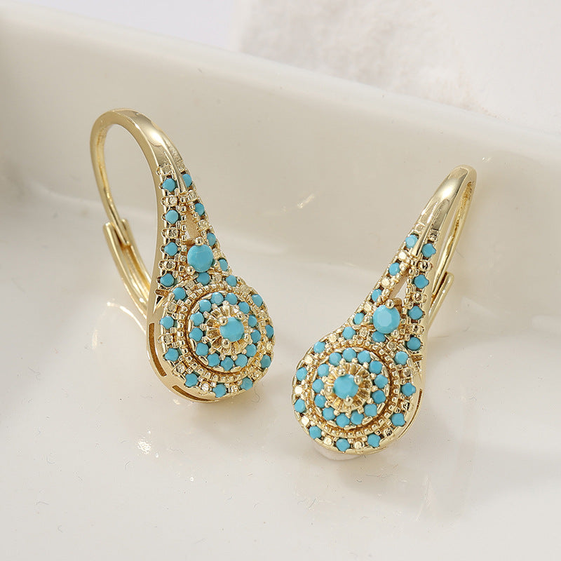 Boucles d'oreilles avec turquoise en or