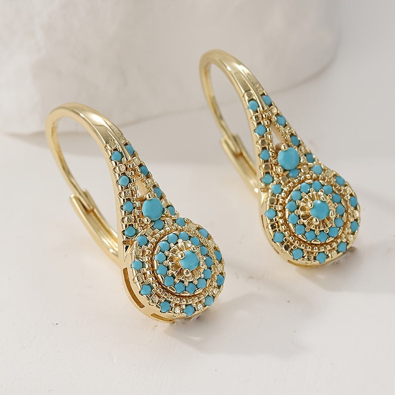 Boucles d'oreilles avec turquoise en or