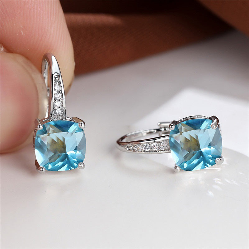 Boucles d'oreilles en pierre mystique en or blanc
