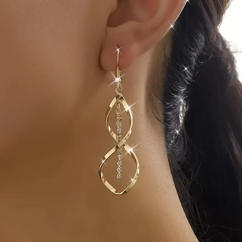 Boucles d'oreilles en spirale rayon de soleil en or
