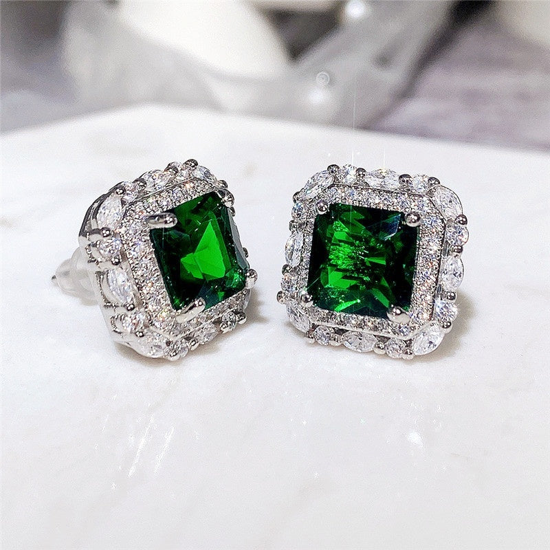 Boucles d'oreilles à brillants et émeraude en or