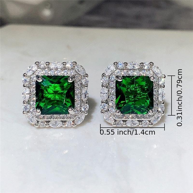 Boucles d'oreilles à brillants et émeraude en or