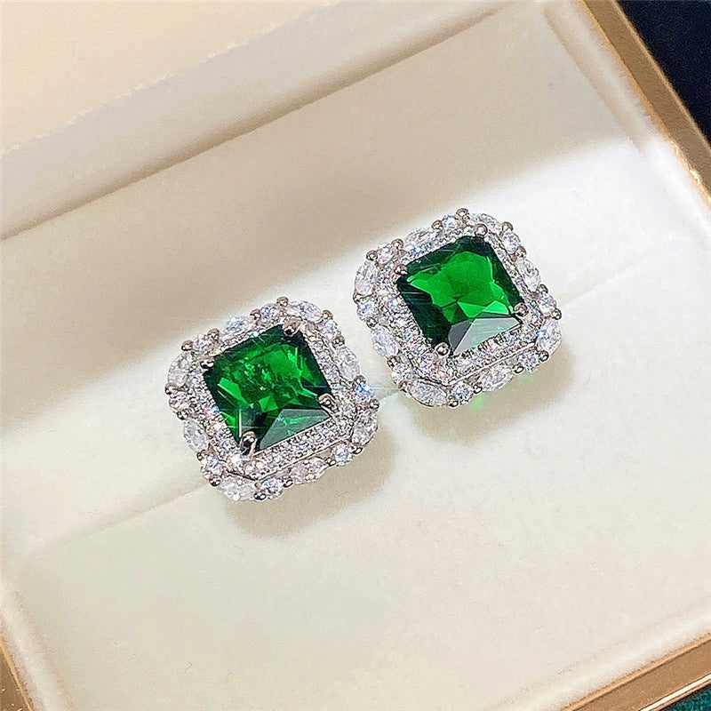 Boucles d'oreilles à brillants et émeraude en or