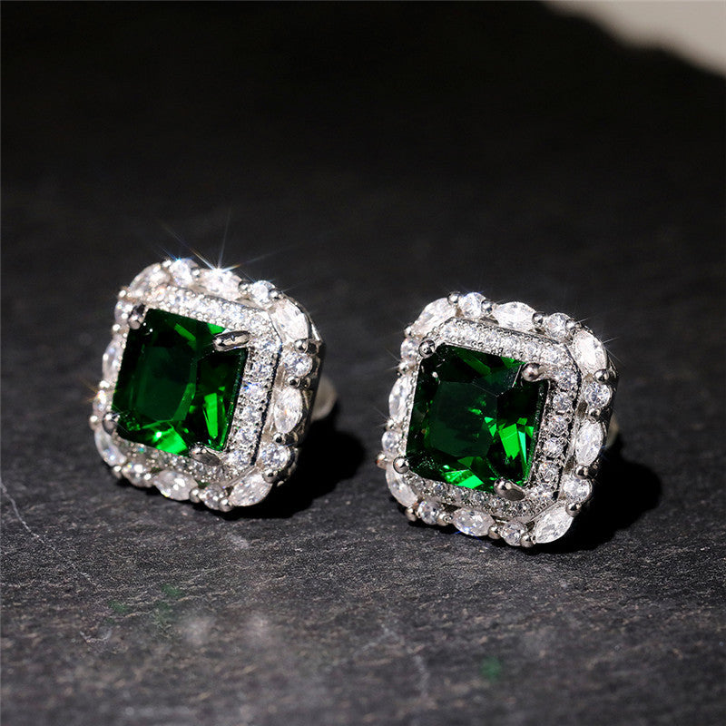 Boucles d'oreilles à brillants et émeraude en or