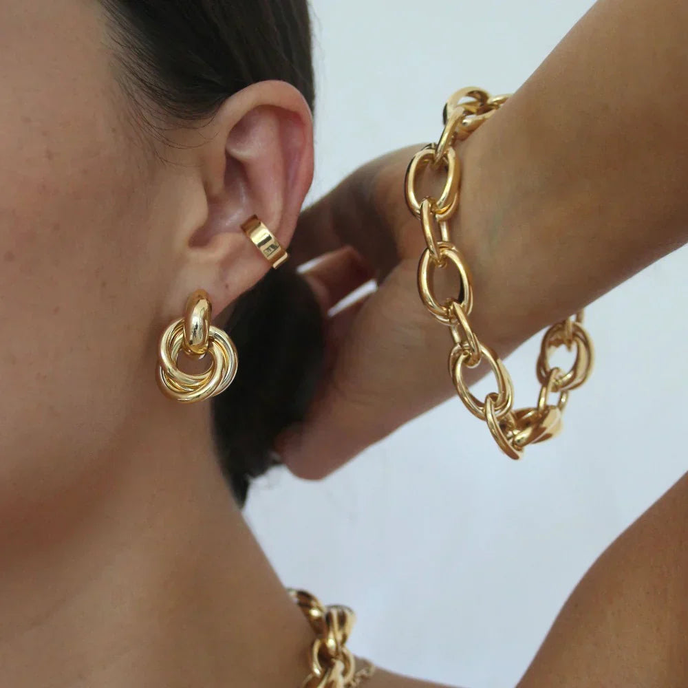 Boucles d'oreilles entrelacées en or