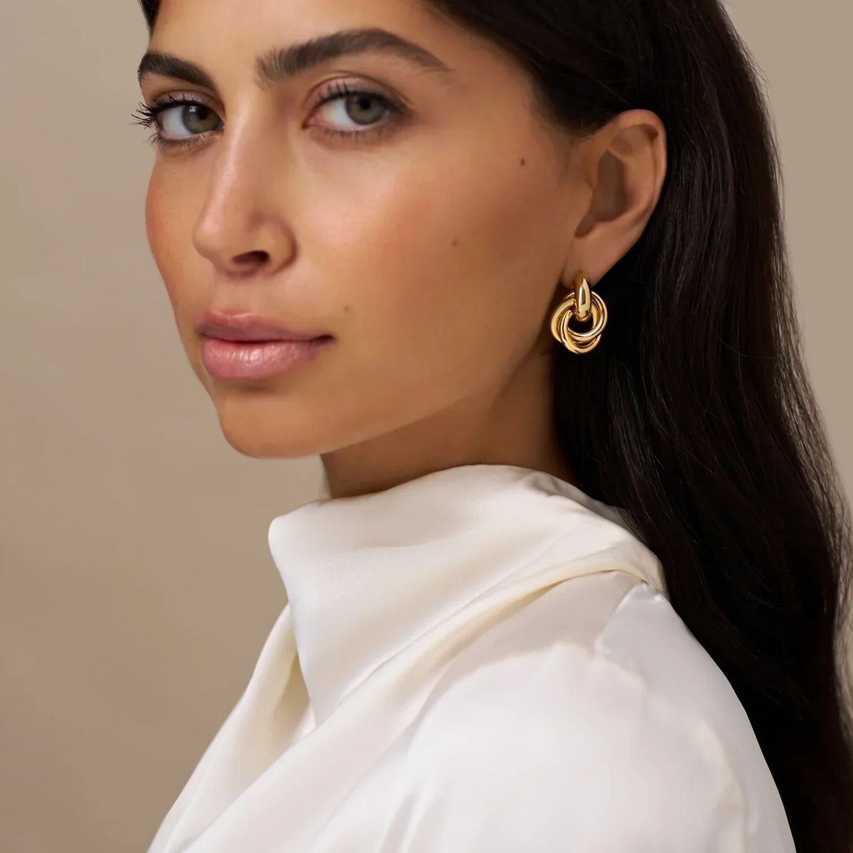 Boucles d'oreilles entrelacées en or