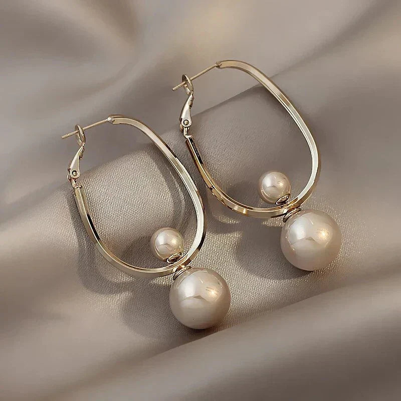 Boucles d'oreilles fascinantes avec perles en or