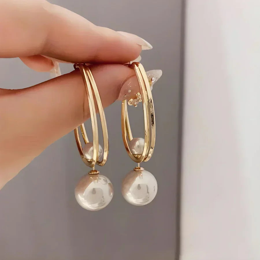 Boucles d'oreilles fascinantes avec perles en or