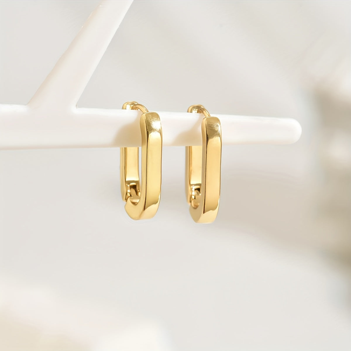 Boucles d'oreilles géométriques élégantes en or