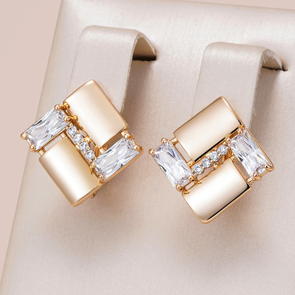 Boucles d'oreilles géométriques élégantes avec zircon en or