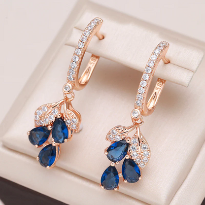 Boucles d'oreilles pendantes avec des cristaux bleus