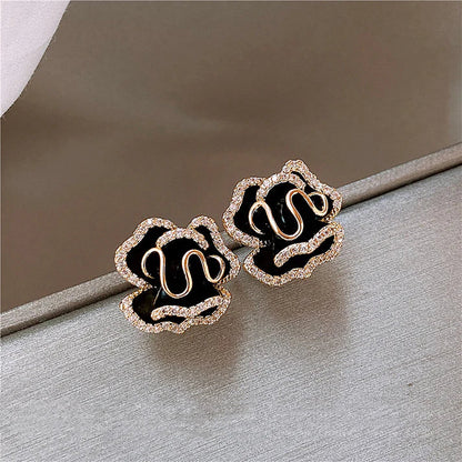 Boucles d'oreilles pendantes dorées « Fleur de Lotus Noire »