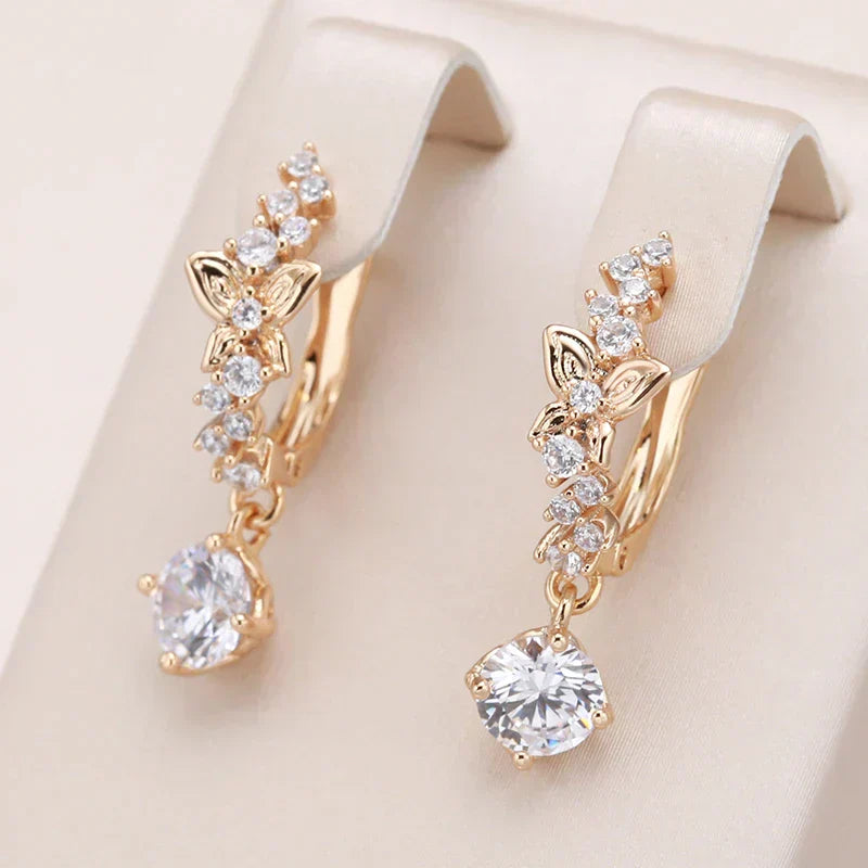 Boucles d'oreilles pendantes à brillants en or