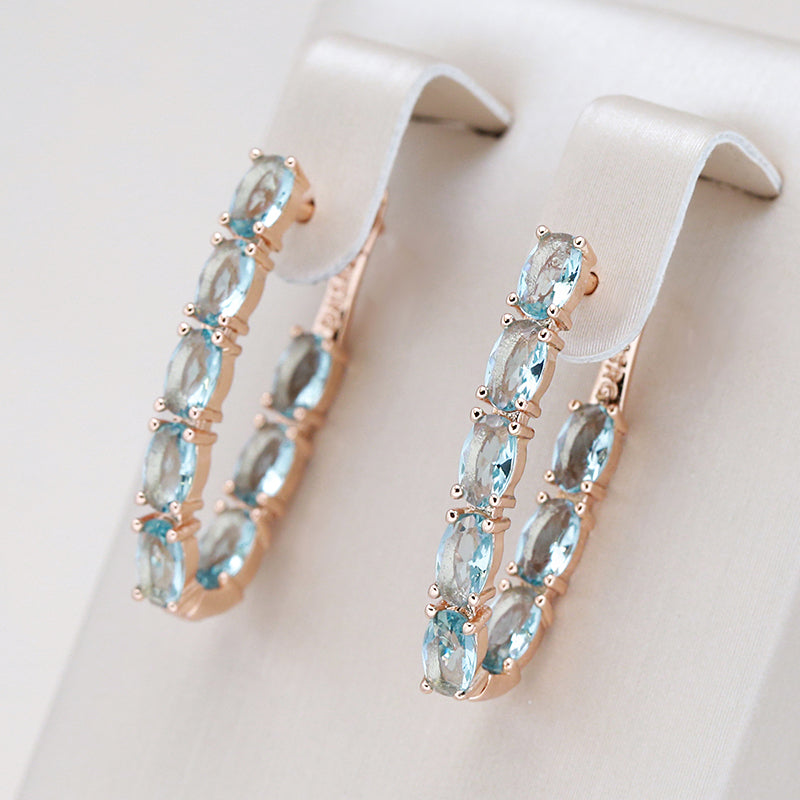 Boucles d'oreilles pendantes en turquoise et brillants en or