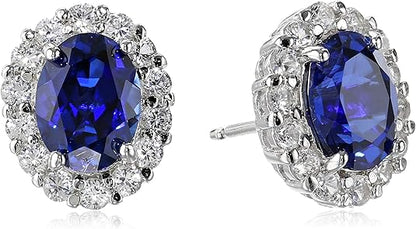 Boucles d'oreilles puces en saphir blanc ovale | Or blanc