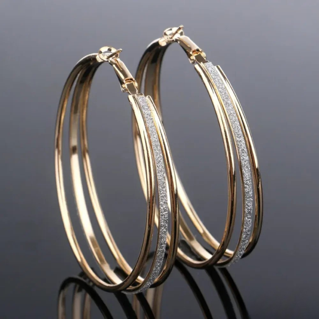 Boucles d'oreilles rétro en or blanc