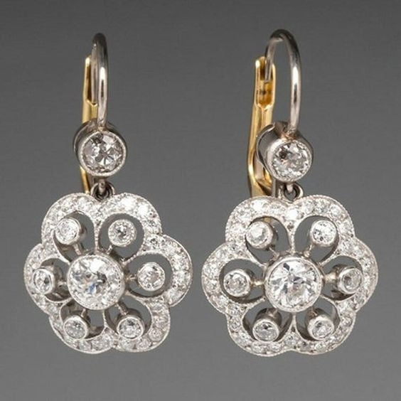 Boucles d'oreilles rétro avec des cristaux en or