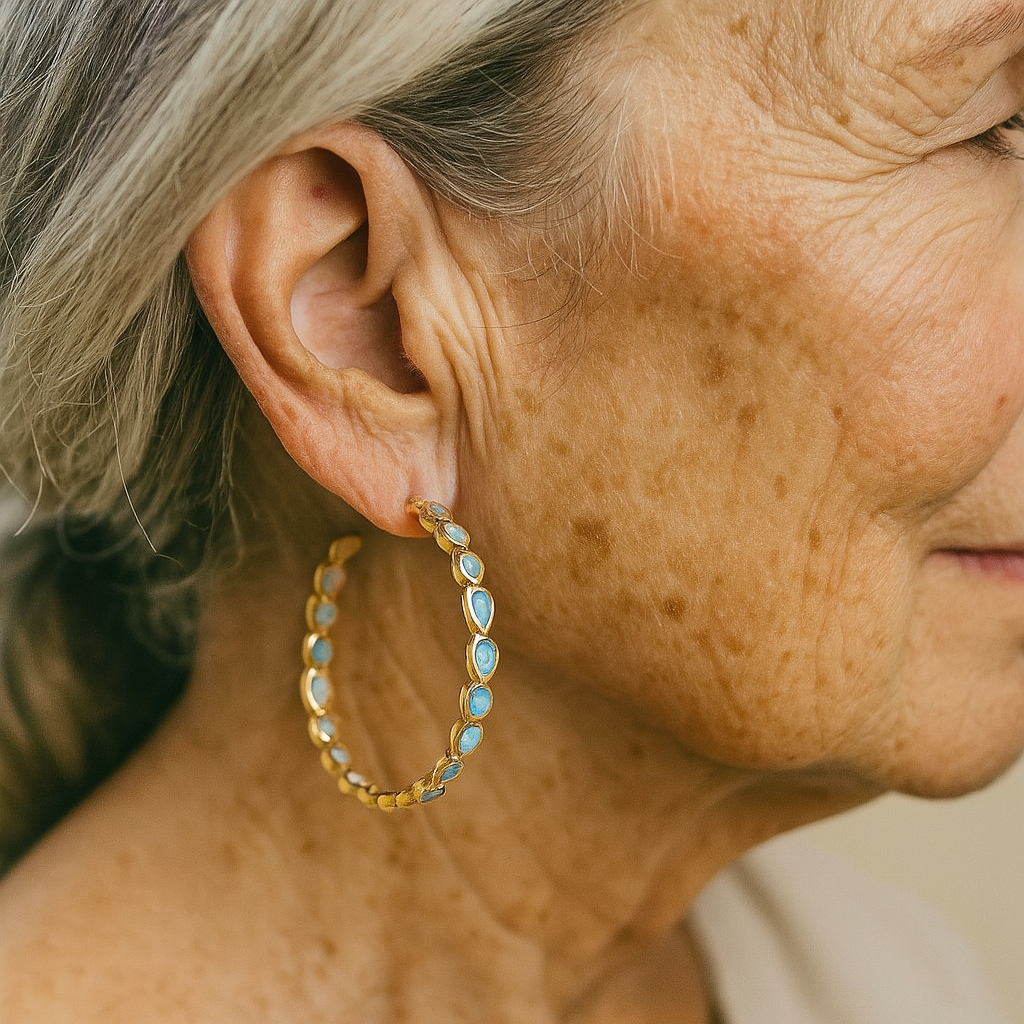 Boucles d'oreilles rétro avec opale bleue en or