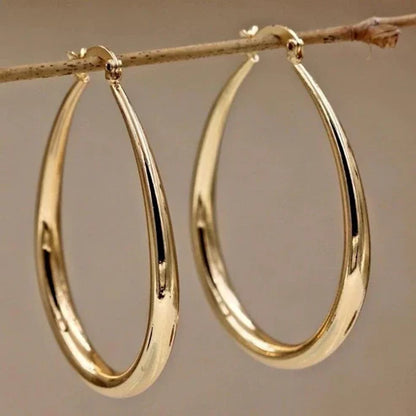 Boucles d'oreilles rétro dorées en forme d'anneau