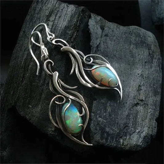 Boucles d'oreilles rétro en argent avec opale bleue