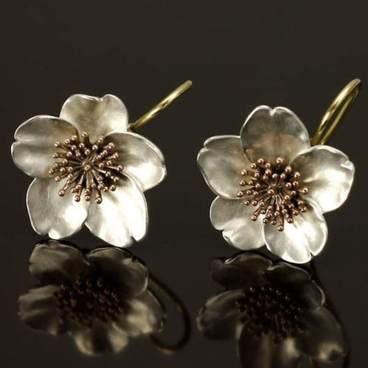 Boucles d'oreilles rétro en argent et or avec des fleurs
