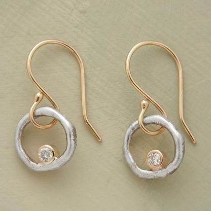 Boucles d'oreilles rétro en or et en argent avec zirconium