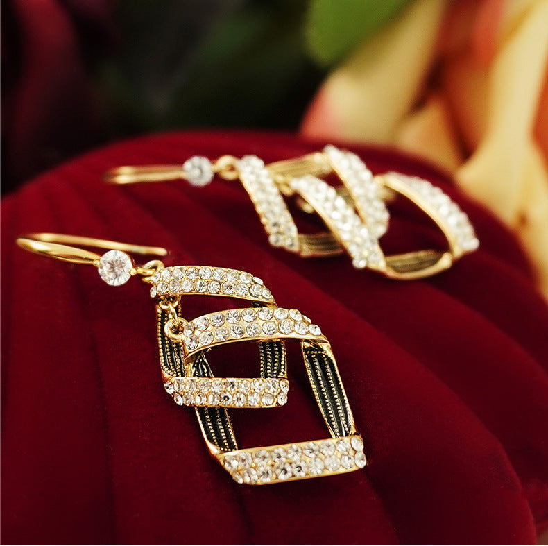 Boucles d'oreilles superposées Stella Virelle en or
