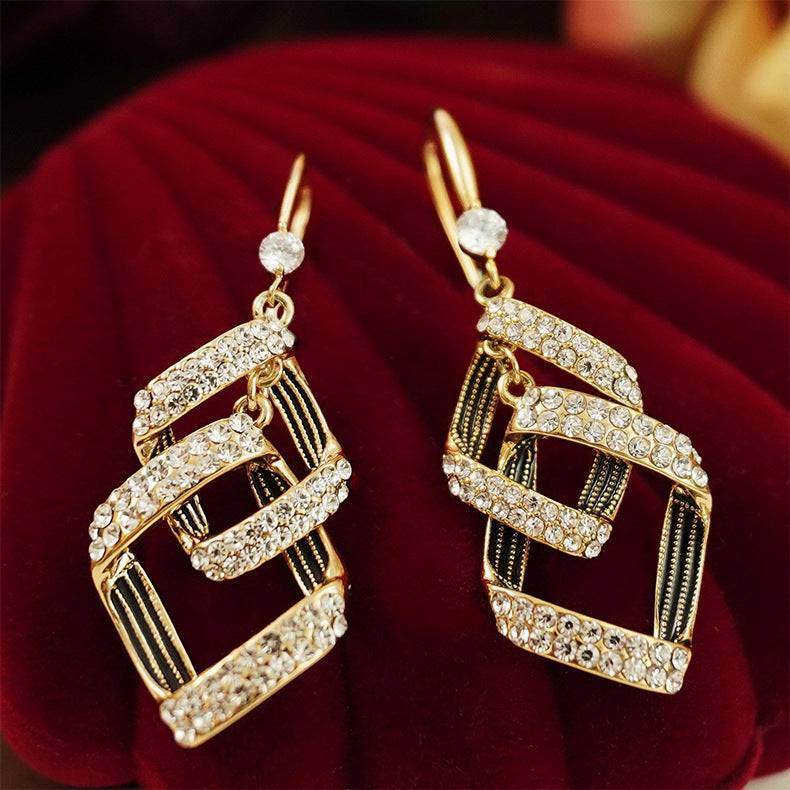 Boucles d'oreilles superposées Stella Virelle en or