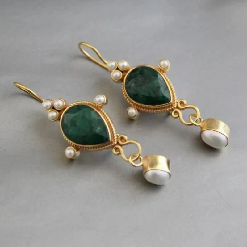 Boucles d'oreilles vintage avec rubis et marguerite en or