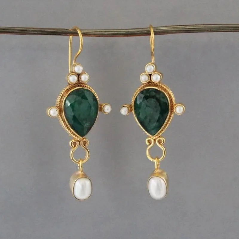 Boucles d'oreilles vintage avec rubis et marguerite en or