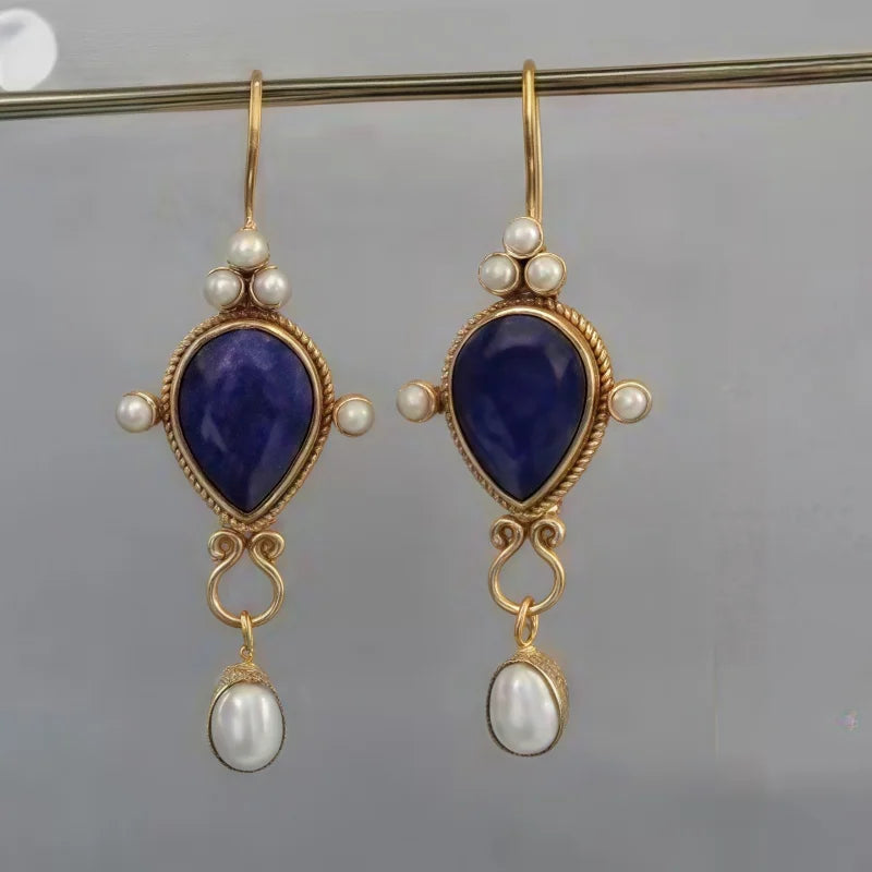 Boucles d'oreilles vintage avec rubis et marguerite en or