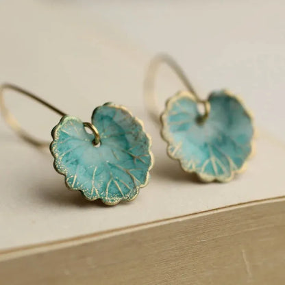 Boucles d'oreilles vintage en forme de feuille bleue