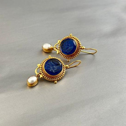 Boucles d'oreilles vintage en or avec perles bleues