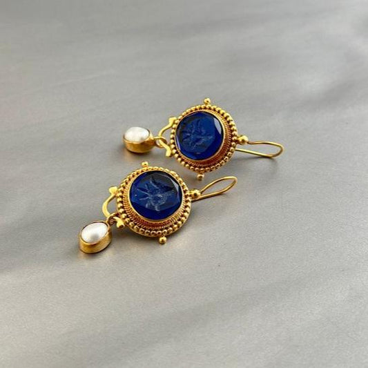 Boucles d'oreilles vintage en or avec perles bleues