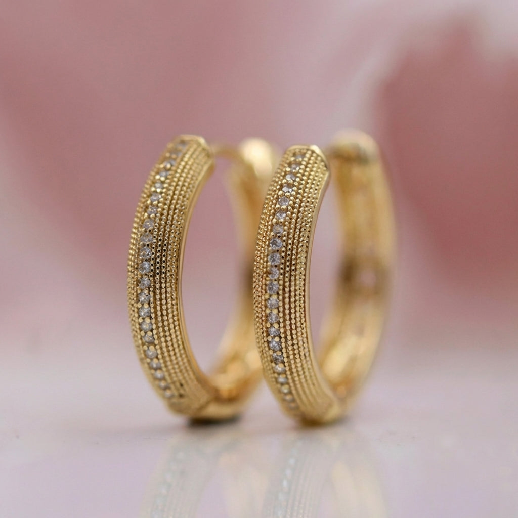Boucles d'oreilles vintage en or avec un design élégant