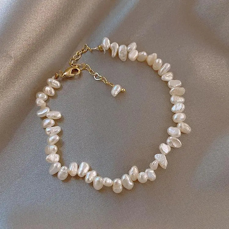 Bracelet « Céline » avec des marguerites en or