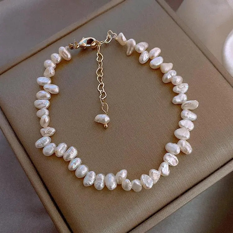 Bracelet « Céline » avec des marguerites en or
