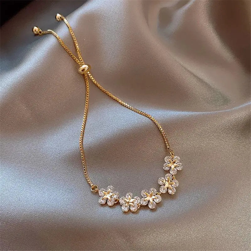 Bracelet marguerite en cristal en or