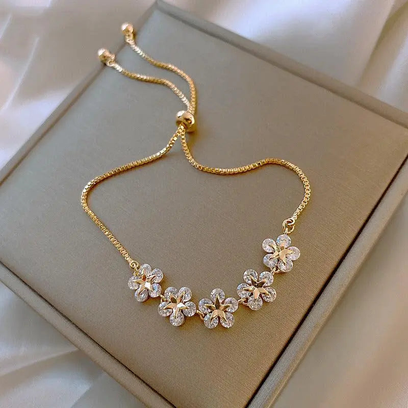 Bracelet marguerite en cristal en or