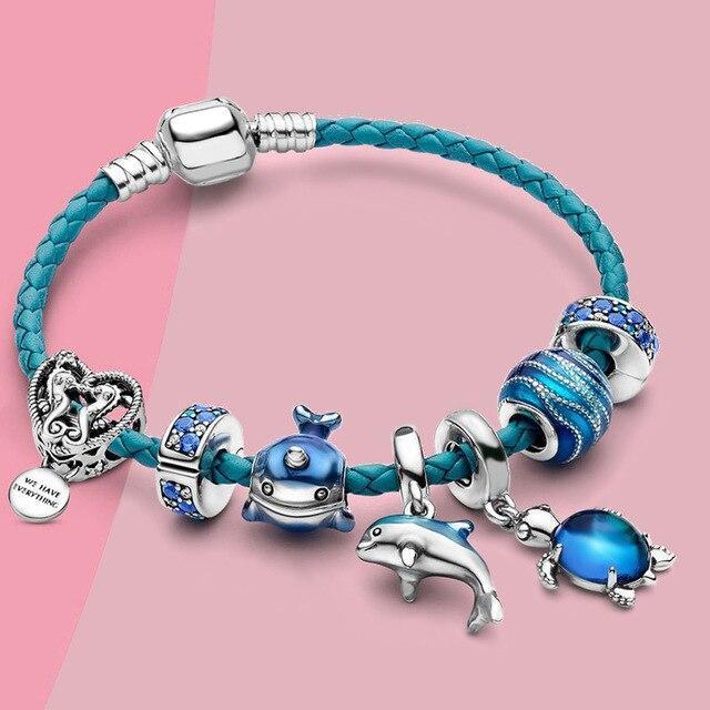 Bracelet océan + pendentifs en cuir et inclus en or blanc