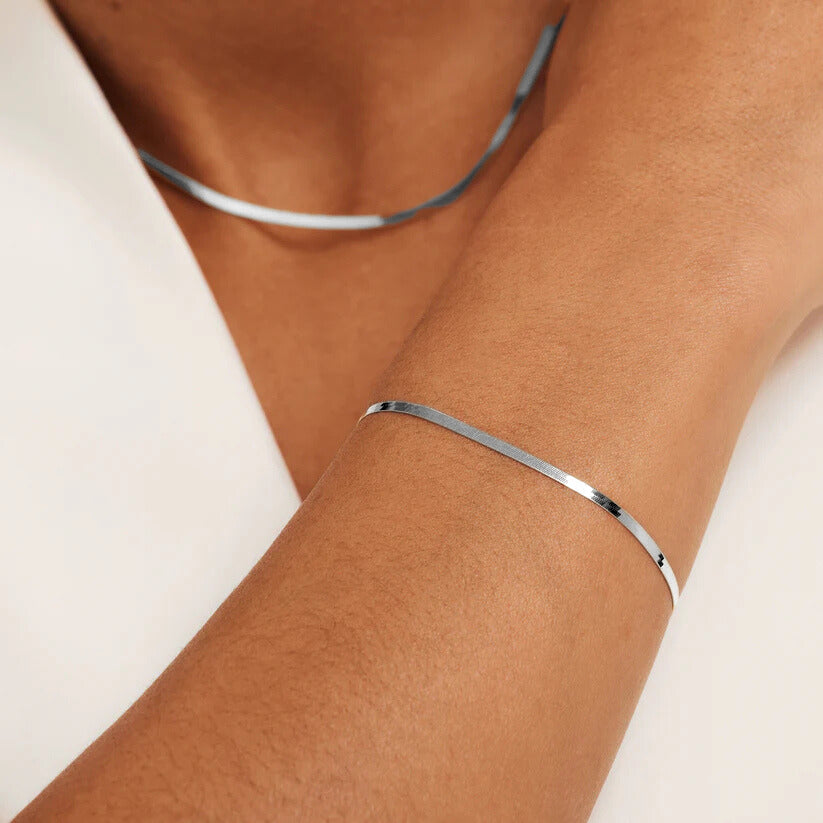 Bracelet soleil serpent en or blanc