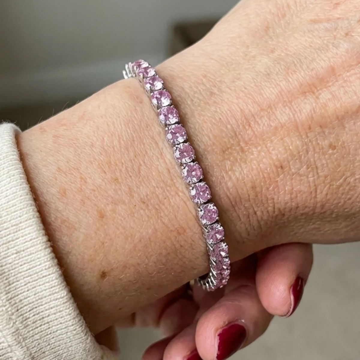 Bracelet tennis en saphir rose en or blanc