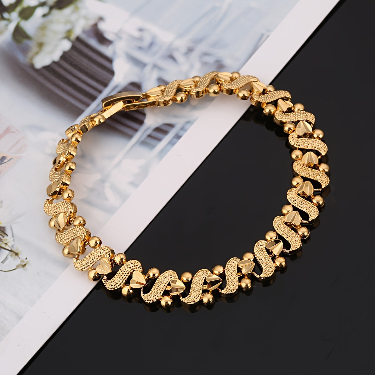 Bracelet vague orné lys en or