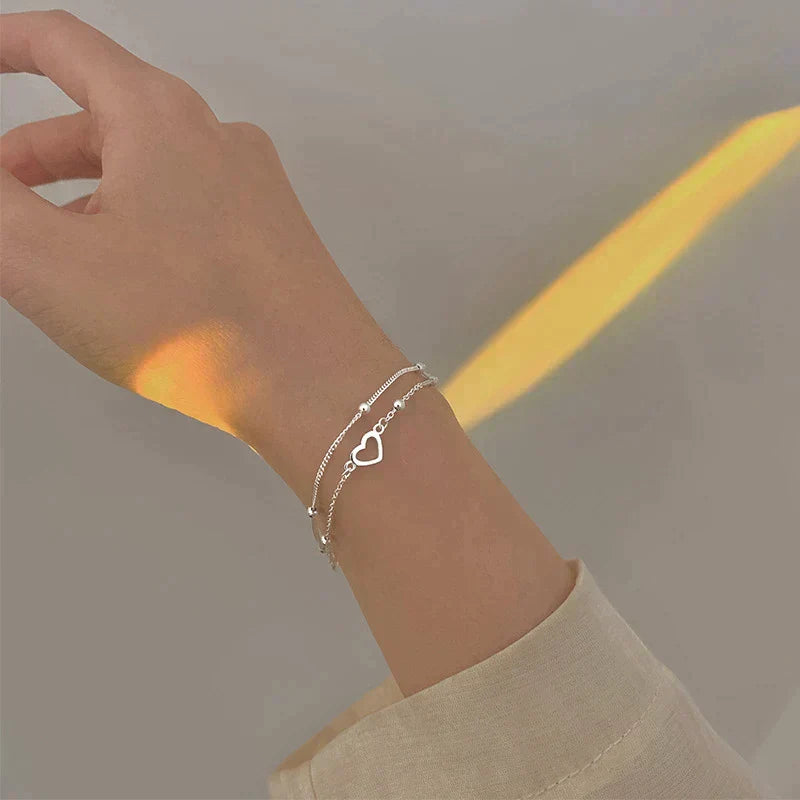 Bracelet ajustable avec cœur en or blanc