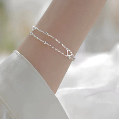 Bracelet ajustable avec cœur en argent