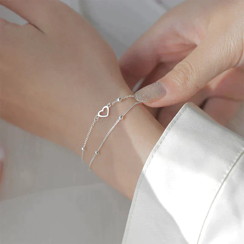 Bracelet ajustable avec cœur en or blanc