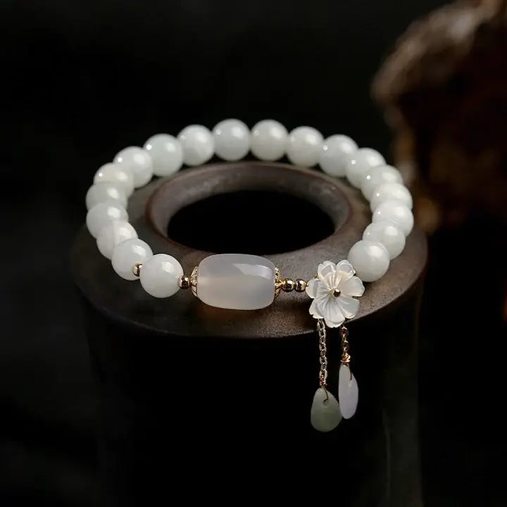 Bracelet avec Aigue-marine et marguerites en or