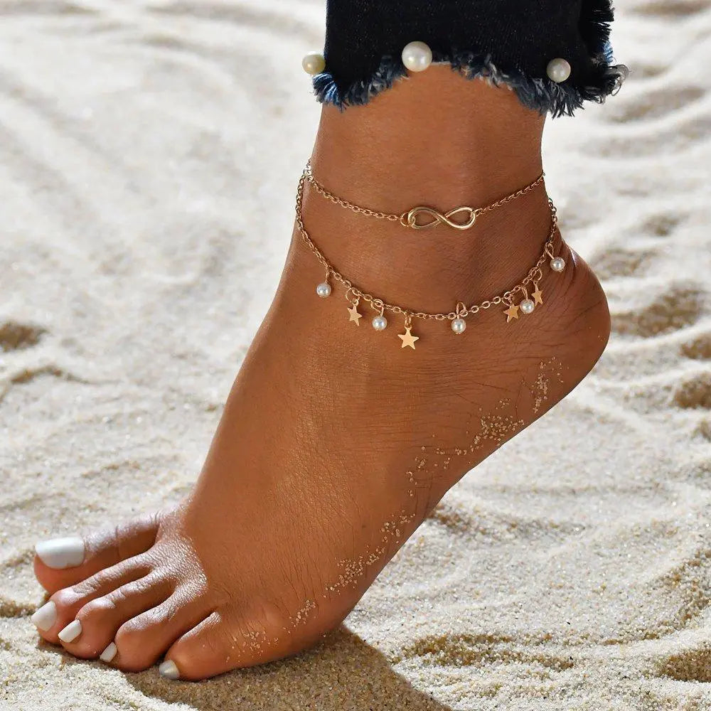 Bracelet avec cordon infini + perles et étoiles en or